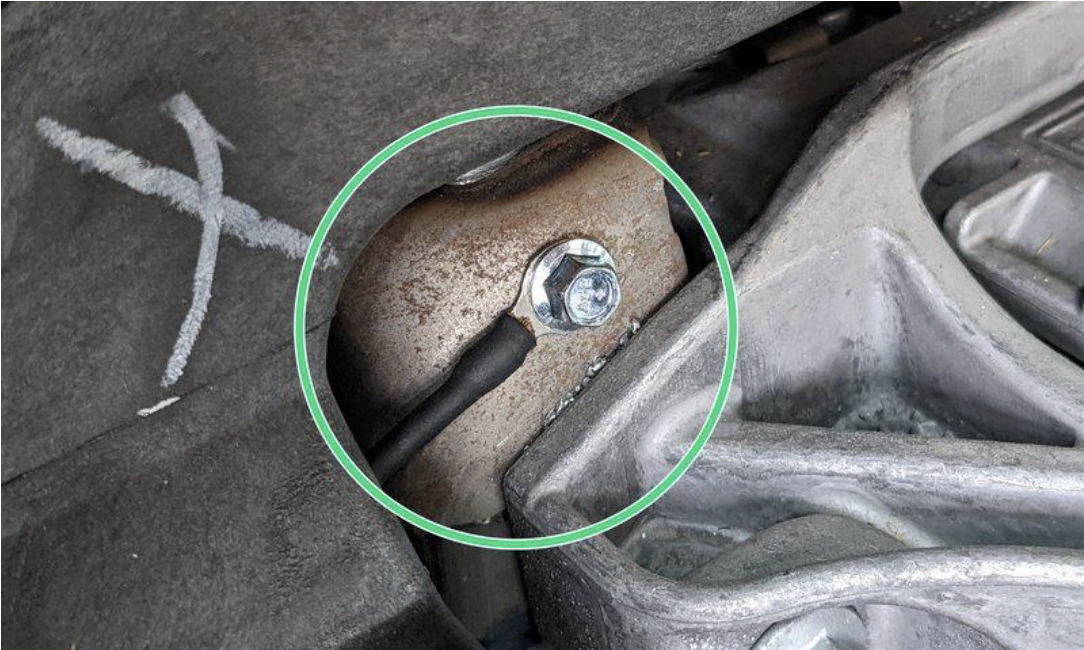 Ring terminal grounded to bare metal