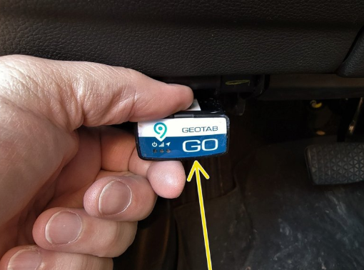 GO9 plugged into OBD-II connector